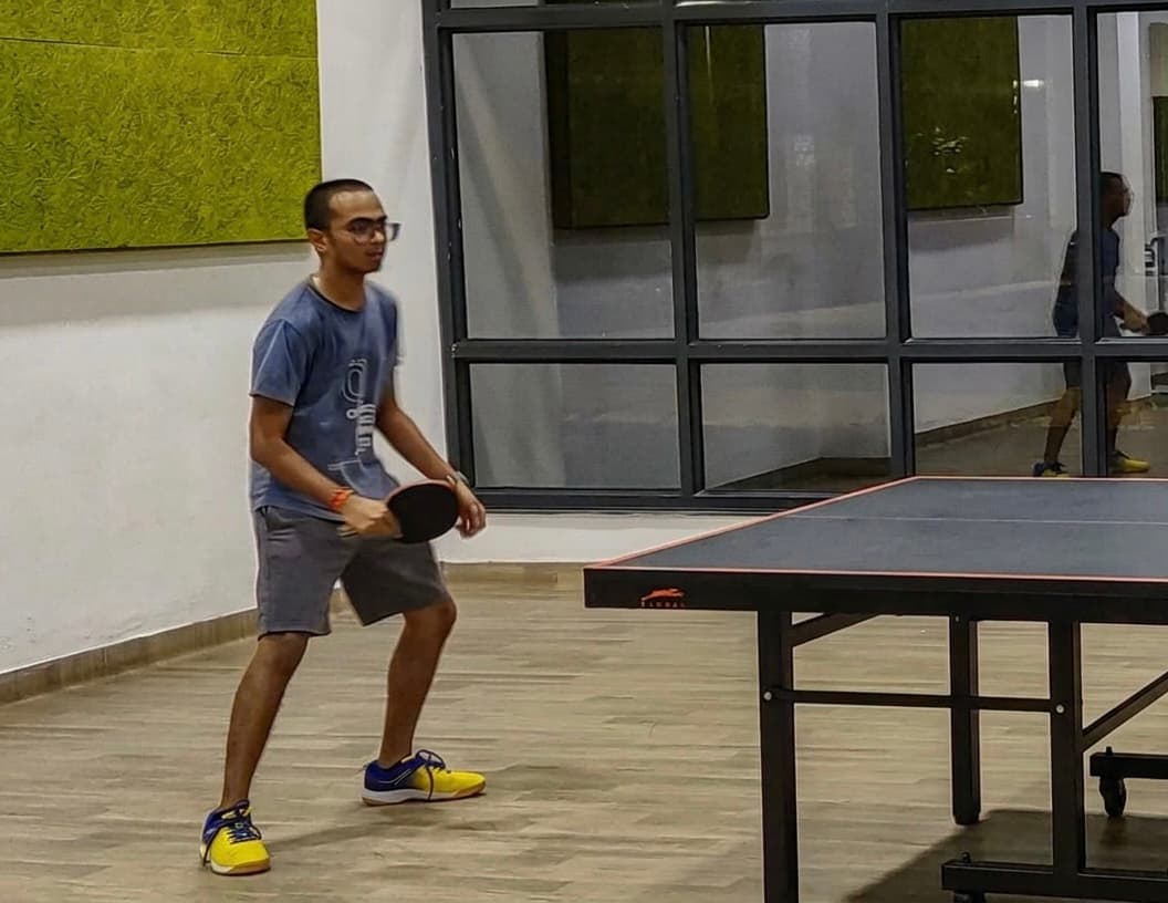Krishna playing table tennis